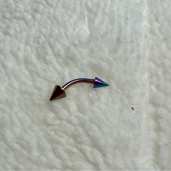 Curved annonized barbell with dual spikes. - Picture 3 of 7